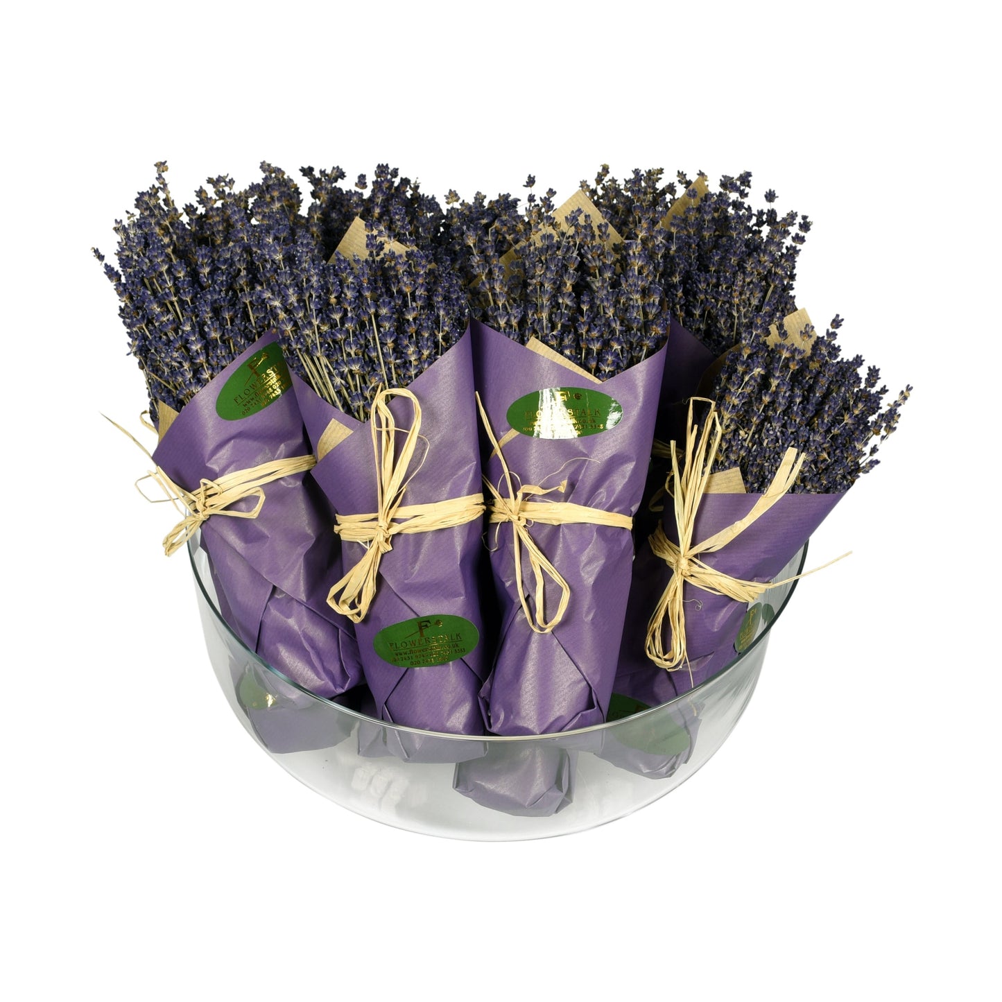 A luxury freeze-dried lavender bunch, with lavender flowers wrapped in purple paper and tied with a string, displayed in a clear container.