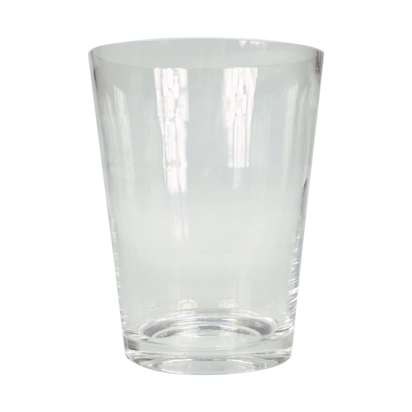 A clear glass vase with no flowers or decorations, suitable for holding bouquets.