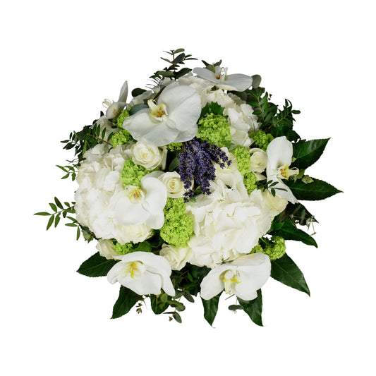 A hand-tied bouquet featuring white phalaenopsis, white hydrangea, white roses, green viburnum, pistachio, and cinerea flowers.