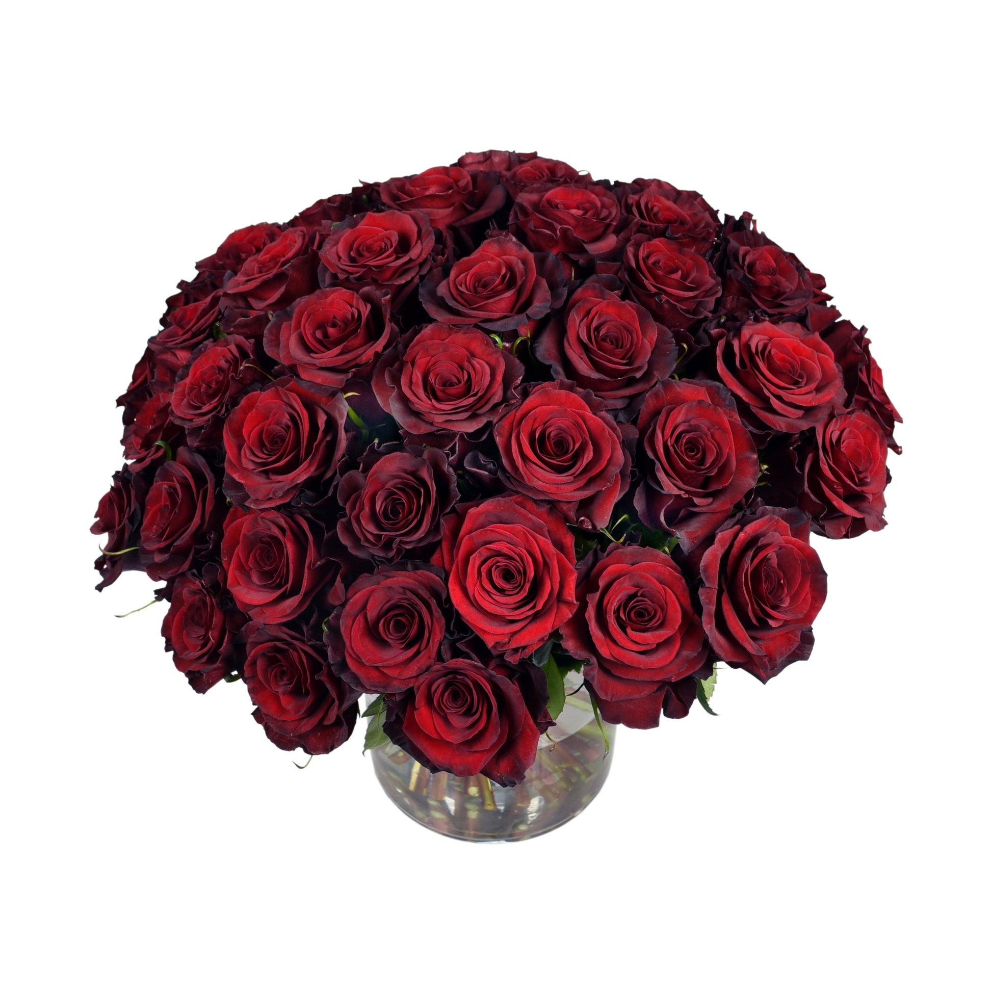 A hand tied bouquet of red roses in a clear vase.