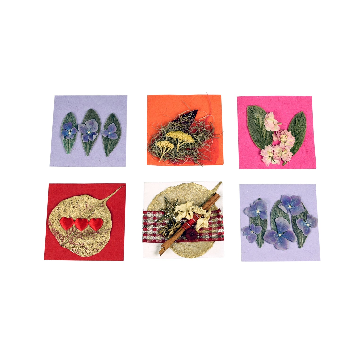 A collection of six hand made greeting cards with various designs, including floral and geometric patterns, accompanied by matching envelopes.