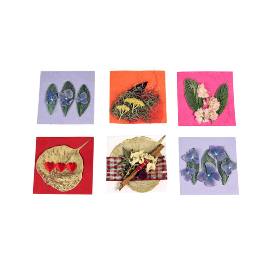 A collection of six hand made greeting cards with various designs, including floral and geometric patterns, accompanied by matching envelopes.