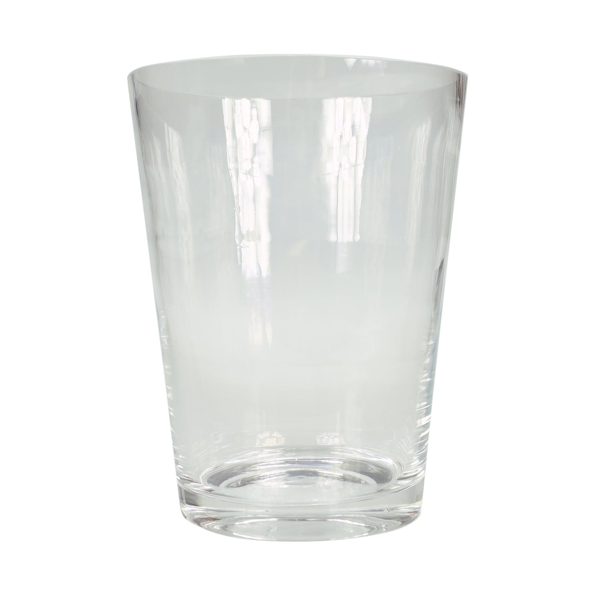 A clear glass vase with no flowers or decorations, suitable for holding bouquets.